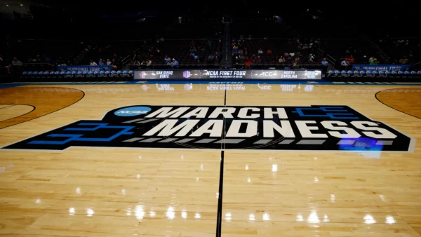 NCAA basketball sues